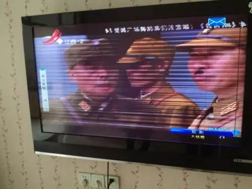 电视只出一半怎么回事